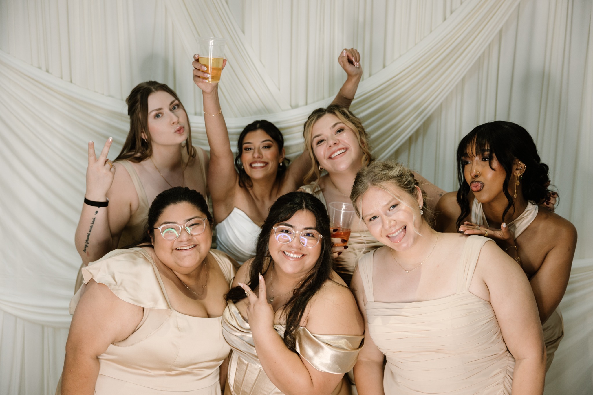 Wedding party enjoying the Skylight Photo Booth